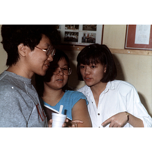 Guests talking at an International Women's Day event