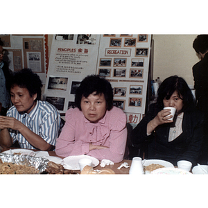 Guests talking at an International Women's Day event