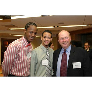 Michael Toney, Odalis David Polanco, and Ted English at the Torch Scholars dinner