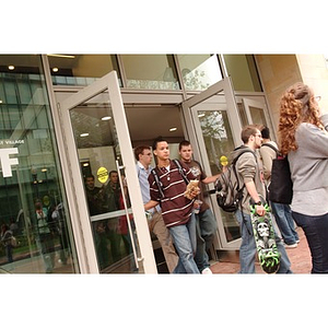 Students exit a classroom building