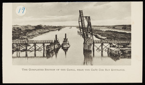 Two steamboats travel under the railroad lift bridge near Cape Cod Bay