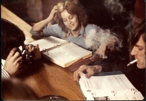 Unidentified commune members at a table