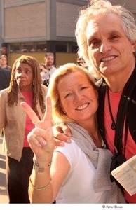 Occupy Wall Street: couple, woman flashing the peace sign