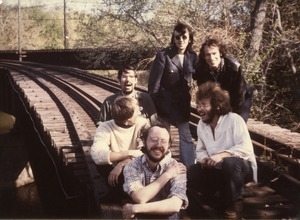 John Anderson, Steve Marsden, Raymond Mungo, John Wilton, Chuck Light, Michael Curry (clockwise from left), on railroad tracks near Montague Farm Commune