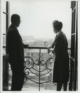 Shirley Graham Du Bois and an unidentified man standing on a balcony