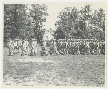 Soldiers marching in a formation on the Springfield college campus (May 1943)