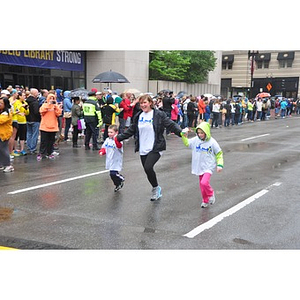 Family gets ready to cross One Run finish line