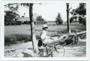 Cyclist in countryside, Thái Bình province