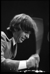 Ringo Starr on drums, in concert with the Beatles, Washington Coliseum