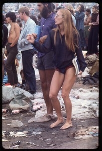 Woman dancing energetically to the music, Woodstock Festival