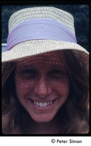 Lacey Mason in a straw hat (close-up), Tree Frog Farm Commune
