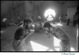 Sufi dancers bowing to one another inside the dome at the Lama Foundation