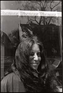 Woman in front of Boston Phoenix office