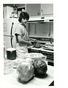 House of Hope volunteer Paul Santos in kitchen