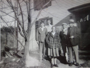 The Russell family at 397 Boston Post Rd. with Sand Hill in the background circa 1940s