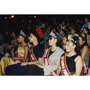 The Queen, King, and Princesses of the Festival Betances sitting in the audience during the beauty contest.