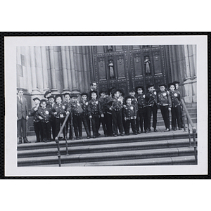 The Bunker Hillbillies pose on the steps of a church