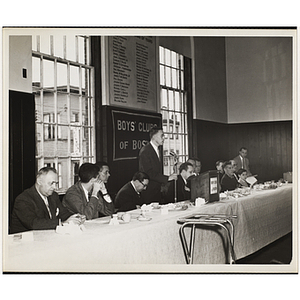 A man speaking at the head table during a Boys' Clubs of Boston awards event