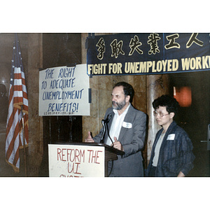 Suzanne Lee and speaker at worker rights and unemployment benefits event