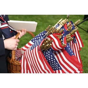 A basket of flags at the Veterans Memorial groundbreaking ceremony