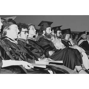 Graduates sit in the audience during Law School commencement