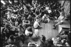 Michael Metelica addressing a crowd of commune members at a meeting inside the Brotherhood of the Spirit dormitory, Warwick, Mass. (view from above)