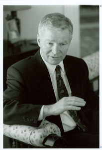 William M. Bulger speaking while sitting
