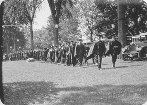 Graduates parading through campus