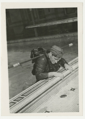 Soldier is getting out of the Mccurdy Natatorium (1942)