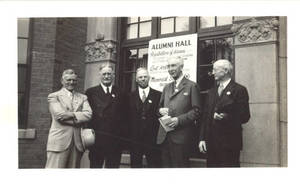 Dr. James Naismith with Fellow Alum in Front of Alumni Hall