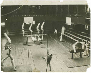 Gymnasts practicing in Judd Gymnasium