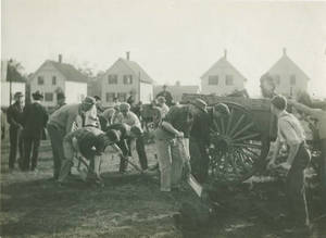 Students working on grounds at the athletic fields